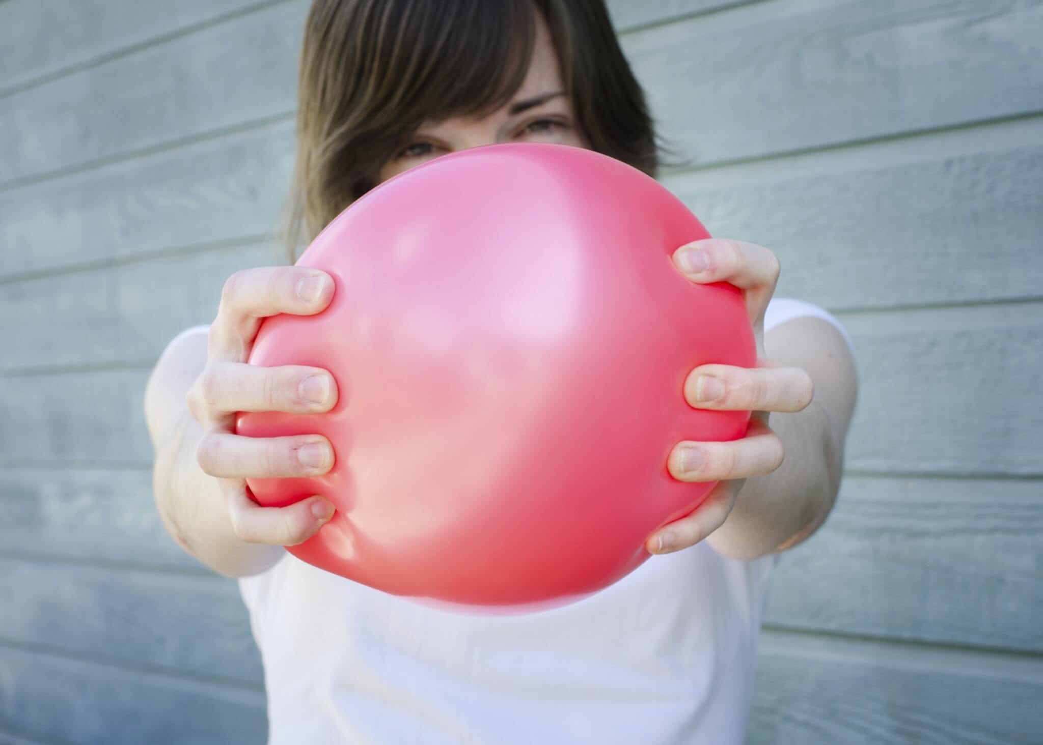 Squeezing Red Balloon 000021491116 Medium jpg